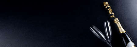 Glasses of champagne with splash, celebration theme conceptの写真素材