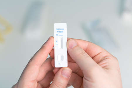 Covid rapid antigen nasal test. Self test at home or at corona test station.の写真素材
