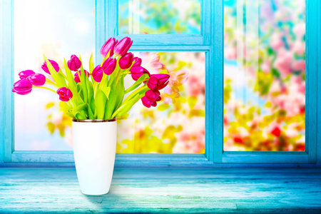 Beautiful nature scene with blooming flowers tree.