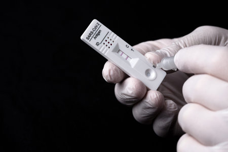 Express corona test. Positive covid antigen test.の写真素材