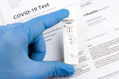 Express corona test. Positive covid antigen test.の写真素材