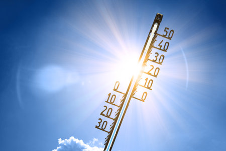 Mercury thermometer. Summer heat or global warming climate change concept.の写真素材