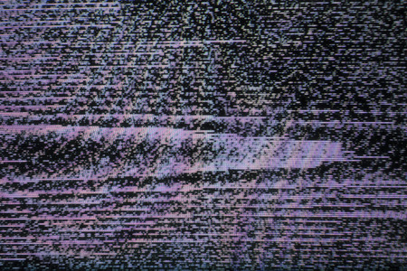 Television screen with static noise caused by bad signal receptionの写真素材
