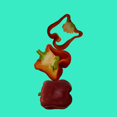Red bell pepper pattern on a blue background. View from above. Food background. Pepper pattern on a blue background. Flat lay of pepper. Pepper wallpaper.の写真素材