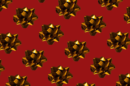 Gold bow on christmas red background. High Angle View Of Christmas Decoration On Red Background.