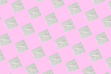 Minimal Composition Background From White Gift Boxes. Festive concept. Several gift boxes arranged...