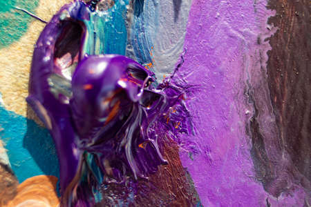 Art Palette. Close-up of an Art Palette with Colorful Mixed Paints. Oil Painting Texture, Painted Colorful Background.の写真素材