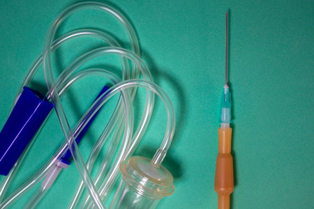 Medical Plastic Intravenous System. Close-up of a Dropper, Central Vein Conduit on a Blue...