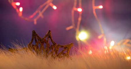 Snowflake Christmas Ornament on a Blue, Pink Background. Happy New Year and Marry Christmas.の写真素材
