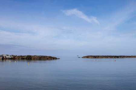 Rocky Morning View of the Coast of the Tyrrhenian Sea With Gorgeous Summer Endless Horizon. Amazing Outdoor Scene of Italy. Beauty of Nature Concept Background.の写真素材
