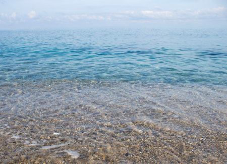The Surface of the Water of a Clear Blue Ocean on a Fabulous Tropical Shore. Wave on the Surface of the Ocean.の写真素材