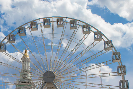 Ferris Wheel Against the Blue Sky. Modern Ferris Wheel.の写真素材