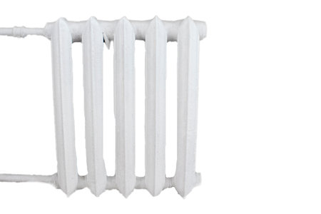 heating battery. White Radiator Isolated on White Background. Iron Radiator of a Central Heating Battery with Many Sections. heating season.の写真素材