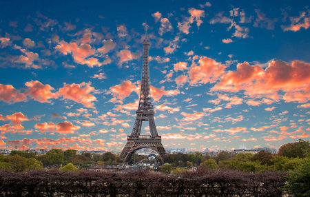 Eiffel Tower at Sunset in Paris, France. romantic travel background. Amazing Panorama of Paris with...