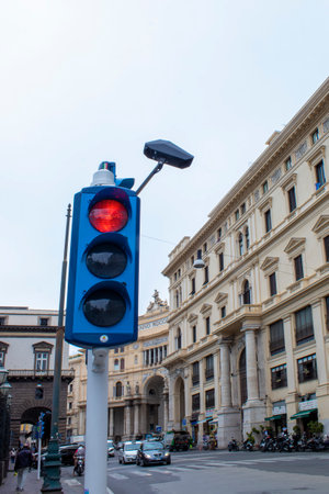 Naples, Italy, June 14, 2023: Crosswalk. Traffic light on the street of Naples in Italy.のeditorial素材