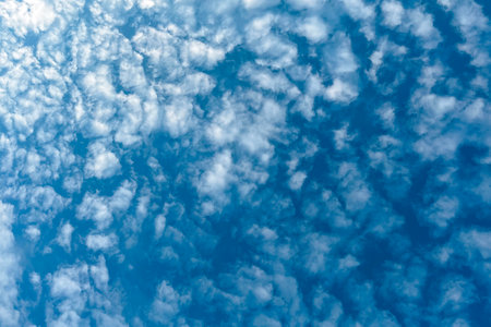 Sky background with clouds. Beauty of white clouds on blue sky with soft sunlight, nature view.の写真素材