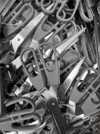 Collection of Various Scissors Stacked Together in a Disorganized Manner Showcasing Different Styles and Designsの写真素材