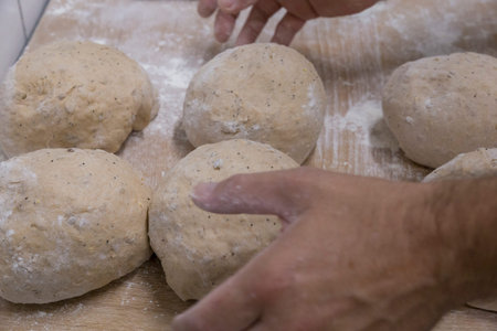 Baker preparing the bread dough