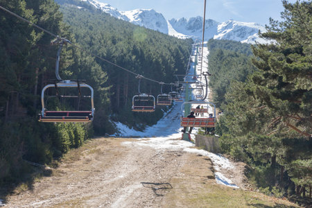 Ski chairlift with people