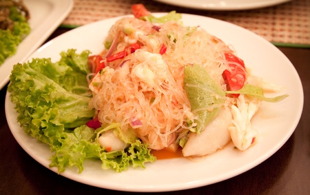 glass noodle with sae food spicy salad which a favorite thai's food.の写真素材