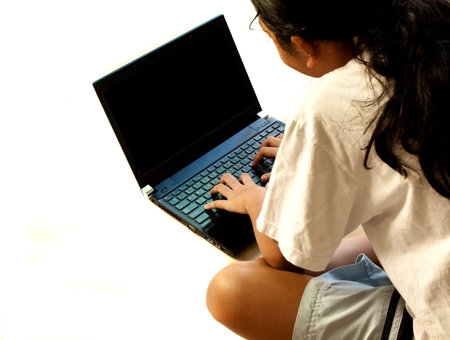 asian girl using notebook computer on white background