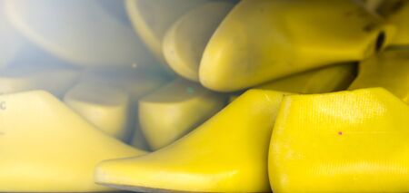 yellow plastic shoe lastform prepare in the shelf of footwear factoryの写真素材