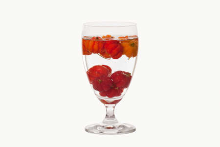 star gooseberry in glass on white backgroundの写真素材