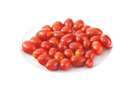 Cherry tomatoes isolated on white backgroundの写真素材