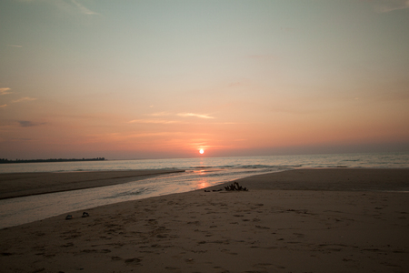 sunset on the beach at Southern of Thailandの写真素材