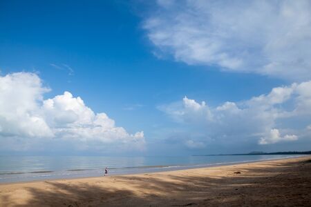 Tourist is walking along beach in the morning at Ko Koh khao island, Phang Nga, Thailandの写真素材