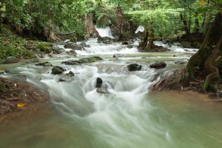 Tao Thong Waterfall is in Tambol Bor Saen, Amphur Tup Bud, Phangnga. Thialand. This hidden waterfall flows from Tao Thong Cave.の写真素材
