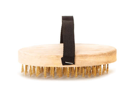 brass wire brush wooden handle on white backgroundの写真素材