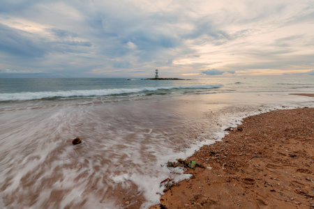 Landscape of Khaolak lighthouse and colorful sky in rainy dayの写真素材