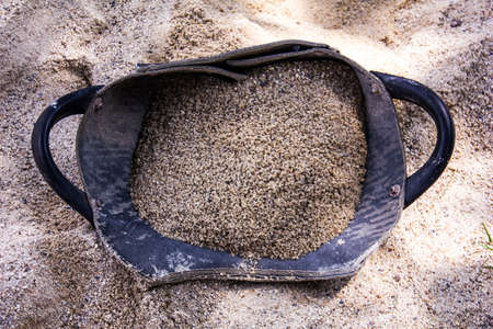 An industrial building used to put a little sand made from car tires .の写真素材