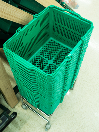 This is green shopping baskets in supermarket.の写真素材