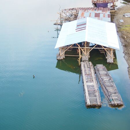 Floating houses on Songalia river in Sangklaburi, Kanchanaburi, Thailandの写真素材