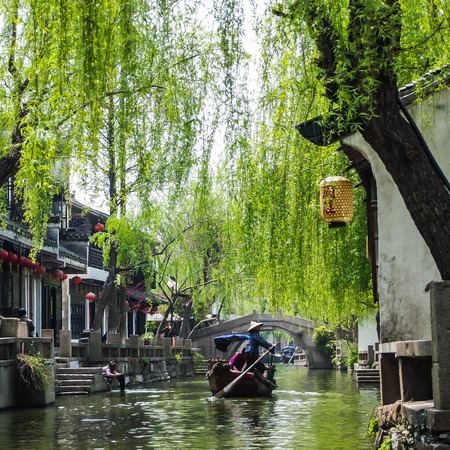 ZHOUZHUANG, SHANGHAI - April 11, 2011 : Zhouzhuang, the ancient water village is Shanghai tourist attraction with 1,000,000 visitors per year and there are a lot of variety activities have done here.のeditorial素材