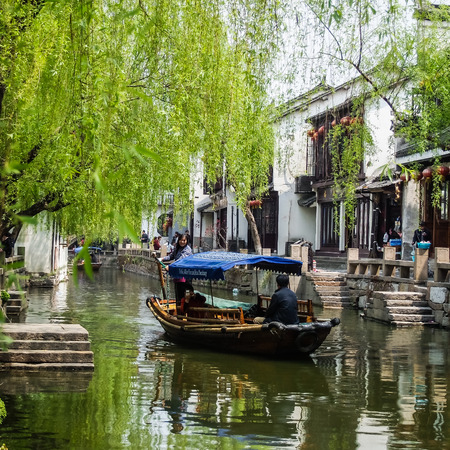 ZHOUZHUANG, SHANGHAI - April 11, 2011 : Zhouzhuang, the ancient water village is Shanghai tourist attraction with 1,000,000 visitors per year and there are a lot of variety activities have done here.のeditorial素材