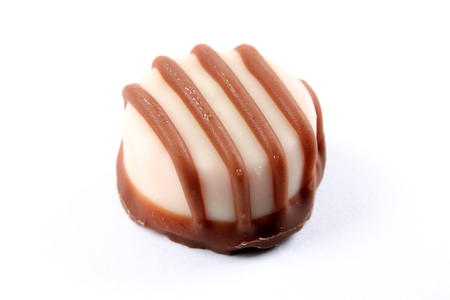 isolated image of fine chocolates in white, dark, and milk chocolateの写真素材