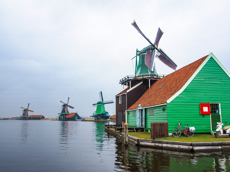 Historic windmills at Zaanse Schans ,neighborhood in the Dutch town of Zaandam, near Amsterdam,  The Netherlands.の写真素材