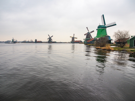 Historic windmills at Zaanse Schans ,neighborhood in the Dutch town of Zaandam, near Amsterdam,  The Netherlands.の写真素材