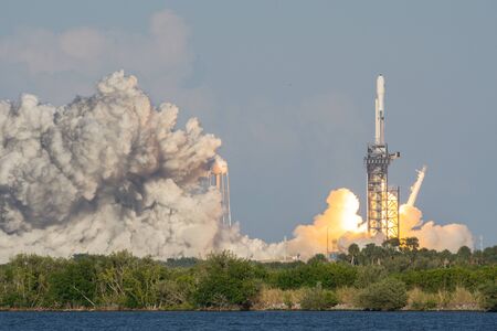 CAPE CANAVERAL, USA - APRIL 11, 2019: SpaceX Falcon Heavy successfully launches to deploy Arabsat-6A satellite into orbit. Viewed from Kennedy Space Center's Banana Creek Launch Viewing Areaのeditorial素材