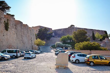 Alicante, Spain - July, 10, 2015 Santa Barbara Castle View from the parking lot for tourist vehicles. Stone head.のeditorial素材