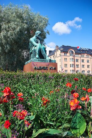 HELSINKI, FINLAND - JULY 17, 2015: Sculpture of Aleksis Kivi on Rautatientori Square.のeditorial素材