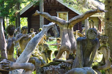 Parikkala, Finland - August 21, 2015: Sculptures by ITE-artist Veijo Ronkkonen in his sculpture park Parikkalan patsaspuisto . The park contains about 560 concrete statues and a magnificent garden.のeditorial素材