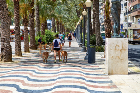 Alicante, Spain - June 30, 2016: The promenade Explanada of Spain in Alicante is paved with 6.5...