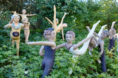 Parikkala, Finland - August 21, 2015: Sculptures by ITE-artist Veijo Ronkkonen in his sculpture park Parikkalan patsaspuisto . The park contains about 560 concrete statues and a magnificent garden.のeditorial素材