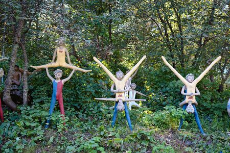 Parikkala, Finland - August 21, 2015: Sculptures by ITE-artist Veijo Ronkkonen in his sculpture park Parikkalan patsaspuisto . The park contains about 560 concrete statues and a magnificent garden.のeditorial素材