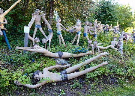 Parikkala, Finland - August 21, 2015: Sculptures by ITE-artist Veijo Ronkkonen in his sculpture park Parikkalan patsaspuisto . The park contains about 560 concrete statues and a magnificent garden.のeditorial素材