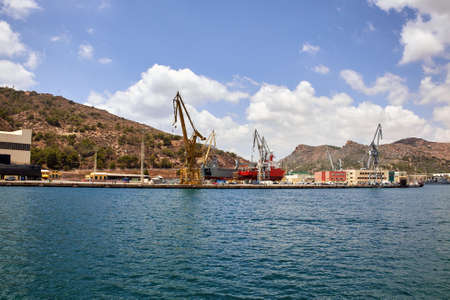 Seaport of Cartagena, Spain. Cartagena Shipyards, sea cranes, the Mediterranean Sea.の写真素材
